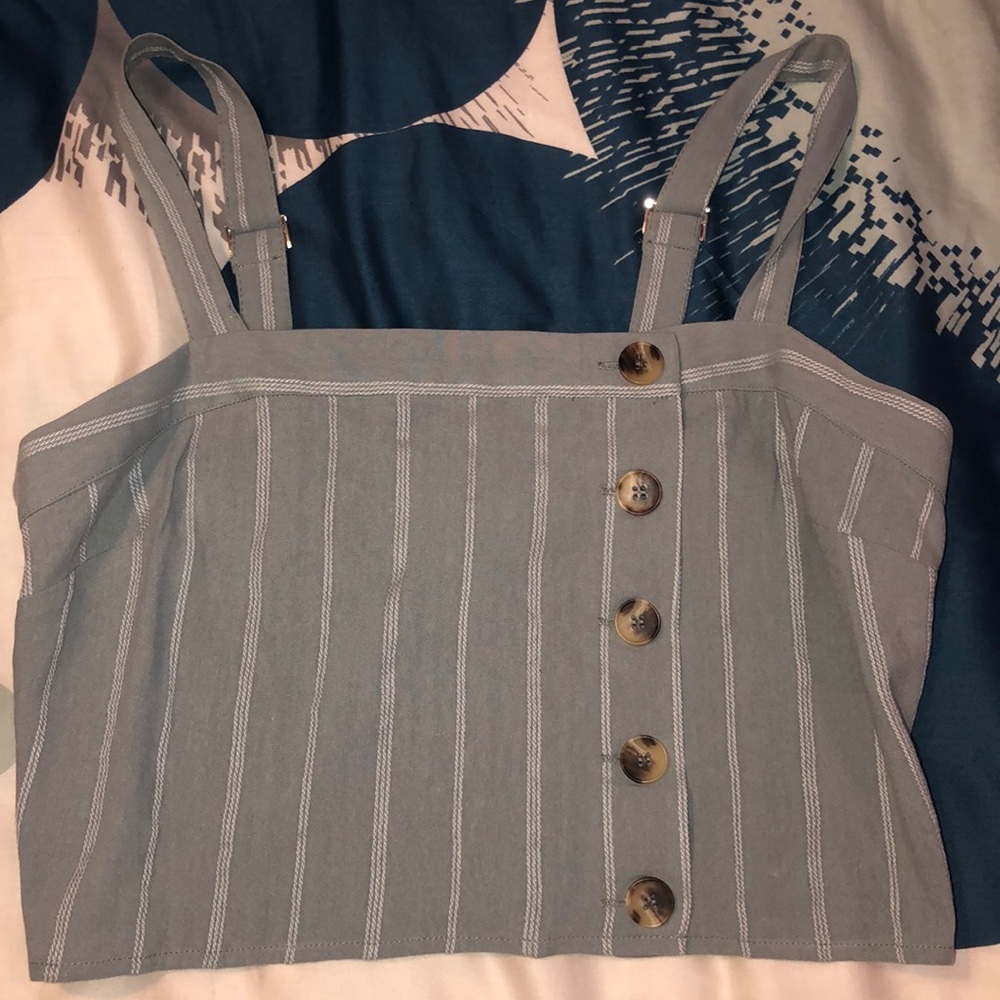 a blue and white tank top